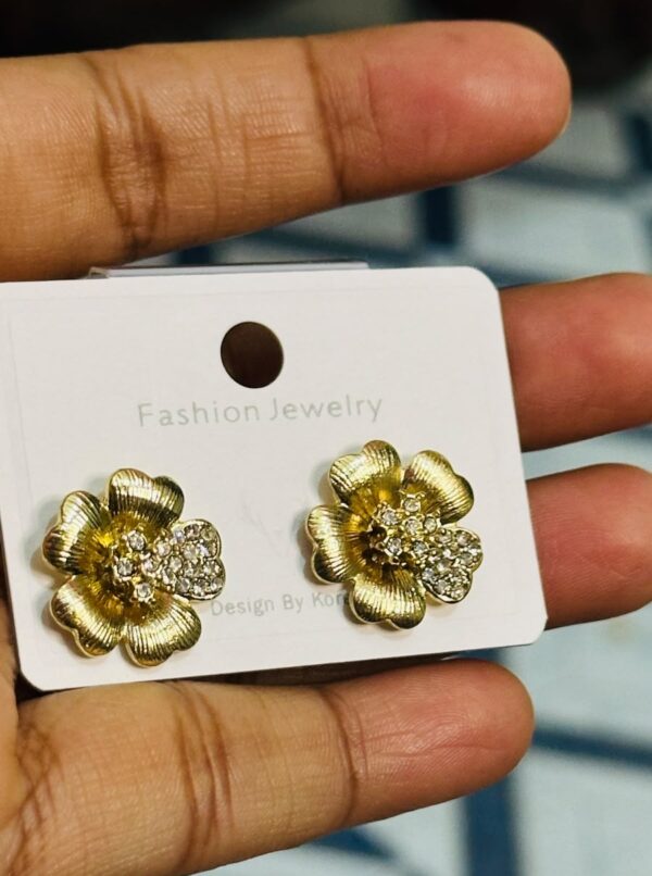 WhatsApp Image 2026-06-28 at 8.22.39 PM Elegant Gold-Tone Floral Stud Earrings